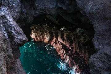 beautiful volcanic rock geological forms of Los Hervideros cliffs with strong atlantic waves in Lanzarote, Canary Islands