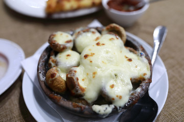 Baked champignons with cheese