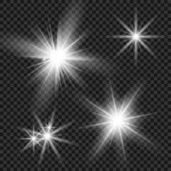 Sparkling magic dust particles. The light of a star. star glow on a transparent background explodes on a transparent background. White light. Bright Star.