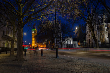 London, England, February 16th, 2017: Long exposure car movement next to Big Ben at Night in London City