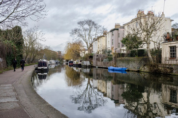 Fototapeta premium London, England, February 19th, 2017: walking next to the canal at London City