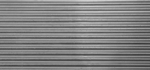 Obraz premium Metal texture pattern, ribbed cast iron surface, textured black background , wall for dark backdrop , loft style interior.