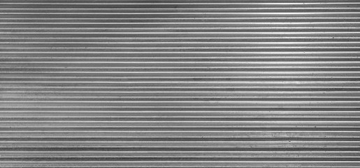 Fototapeta premium Metal texture pattern, ribbed cast iron surface, textured black background , wall for dark backdrop , loft style interior.