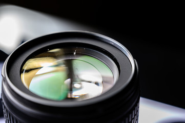 Dust on open camera lens glass