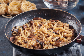 Tagliatelle pasta with champignion mushrooms