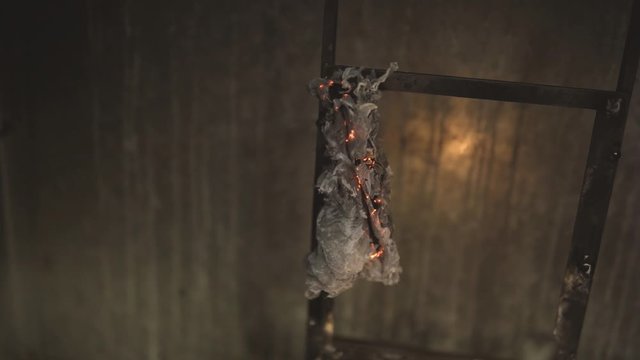 Smoldering materials in a fire test setup. High temperature sample testing. conducting experiments and tests 4k Follow the focus.