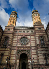 Fototapeta na wymiar The Dohány Street Synagogue, also known as the Great Synagogue or Tabakgasse Synagogue, is a historical building in Erzsébetváros, the 7th district of Budapest, Hungary. It is the largest synagogue in