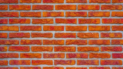 Fire red rustic brick wall texture, colorful trend color 2020