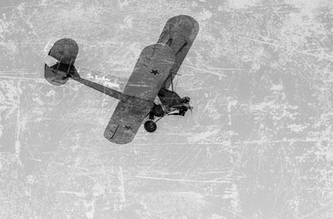 Retro Russian aeroplane Polikarpov PO-2 in the blue sky