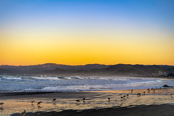 Fototapeta na wymiar Sunrise on the Beach