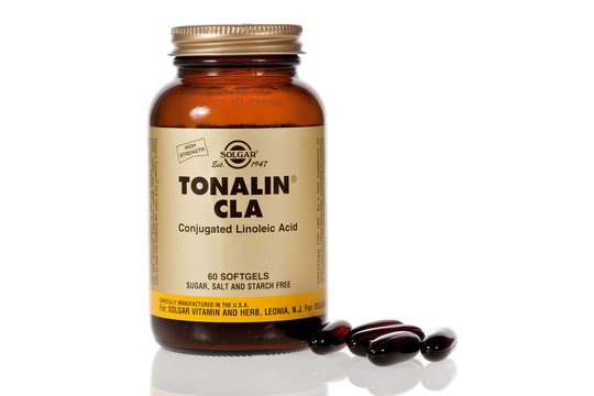 Lisbon, Portugal. February 7, 2020: Solgar Tonalin CLA. Conjugated Linoleic Acid From. Weight Loss Fat Burner Diet Supplement. Bottle Of Pills Or Tablets. Cutout, Cut Out Or Isolated White Background