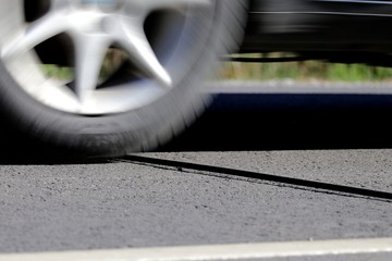 Vehicle Traffic counter on the road. Black Rubber Tubes