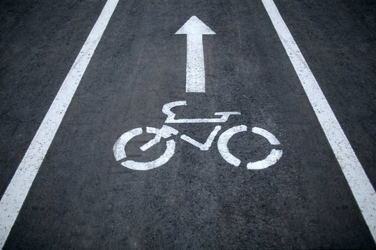 Bicycle sign or icon on the road in the park.