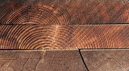 Fototapeta premium 3 Lumber Boards stacked and showing end grain on construction site in Upstate NY