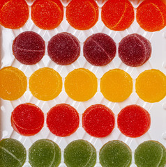 round multi-colored marmalades in a box