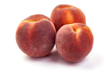 Fototapeta na wymiar Fresh ripe juicy peaches, isolated on white background