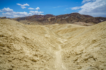 hikink the golden canyon - gower gulch circuit in death valley, california, usa