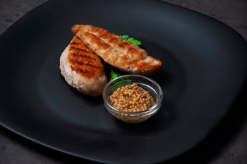 grilled chicken steak with sauce and vegetables