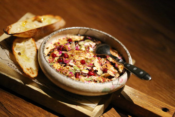 Delicious hummus photo with pomegranate