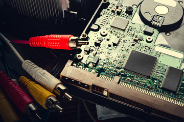Hard drive and cables. Old computer hard drive. Microchips and PC components, storage data and...