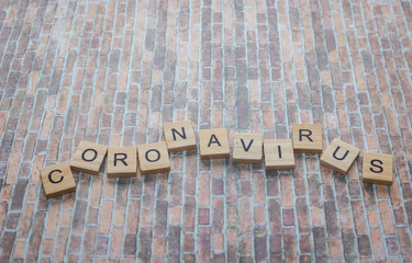 the word coronavirus, made of wooden cubes