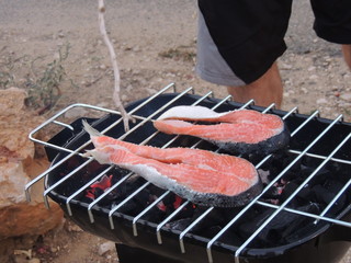 The fish baked on a mangal at the decaying corner.