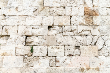 Antique stone wall in the Acropolis of Athens. Brick wall background