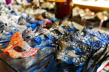 Handmade masks on a store window in Venice. Venetian masks