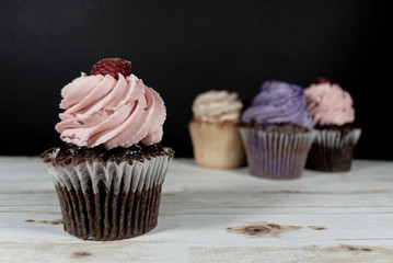 Cupcakes on dark background