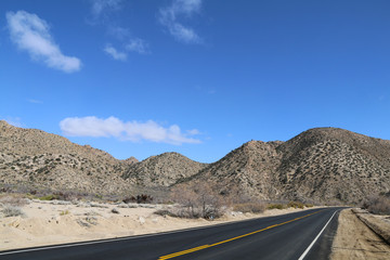 a paved desert mountain ridge road