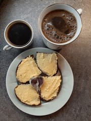 cup of coffee and cookies on wooden table
