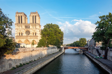 Fototapeta na wymiar The Cathedral of Notre Dame is of Catholic worship, the seat of the Archdiocese of Paris. Dedicated to the Virgin Mary, it is located on the small island of the Cité, surrounded by the Seine River.