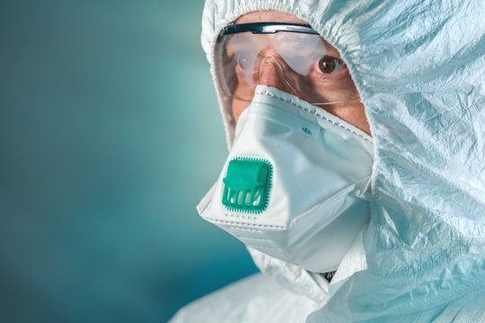 Tired epidemiologist in wuhan-coronavirus quarantine, conceptual image