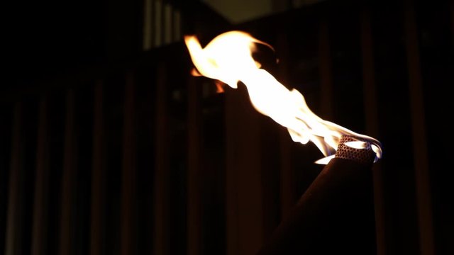 Burning flame torch at night