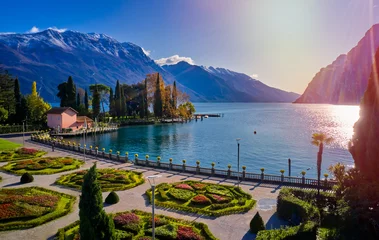 Papier Peint photo Dolomites Beautiful and colorful autumn in Riva del Garda,Panorama of the gorgeous Garda lake surrounded by mountains in the autumn time