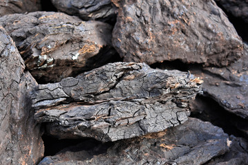 A stack of dry lignite coal ready for heating      