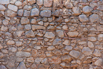 Textured background. Different size and color stones