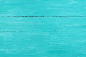 Turquoise painted wooden board. Texture, background.