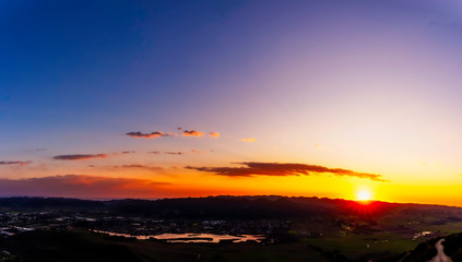 Obraz premium Sunset in the Mountains, valley over Lake, panorama 
