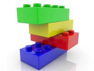 Colored toy bricks in an abstract design above each other