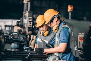 Engineer worker working on electronic a workshop. Engineer looking of working at industrial...