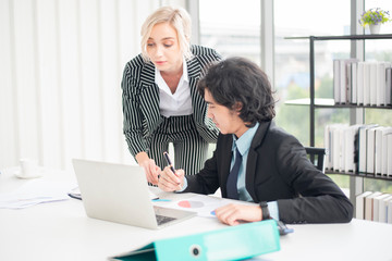 Business people are analyzing financial report