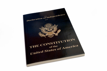 high angle view of book with constitution of united states of america isolated on white