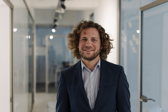 Portrait of confident businessman in office