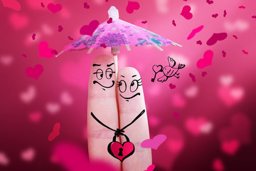 Zwei verliebte Finger mit Regenschirm