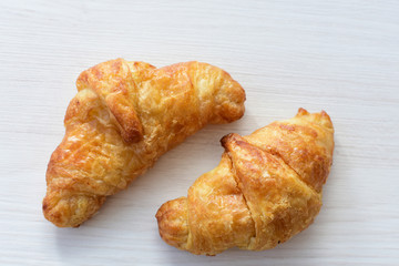 Small, freshly baked butter croissants