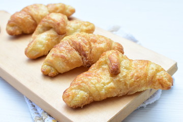 Small, freshly baked butter croissants