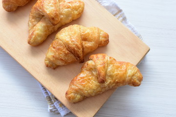 Small, freshly baked butter croissants