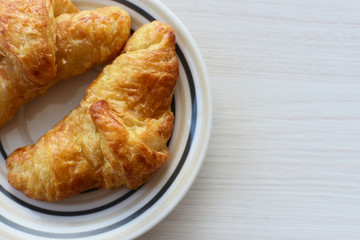 Small, freshly baked butter croissants