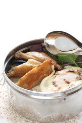 Chinese food, fried egg and chicken wings on rice packed lunch